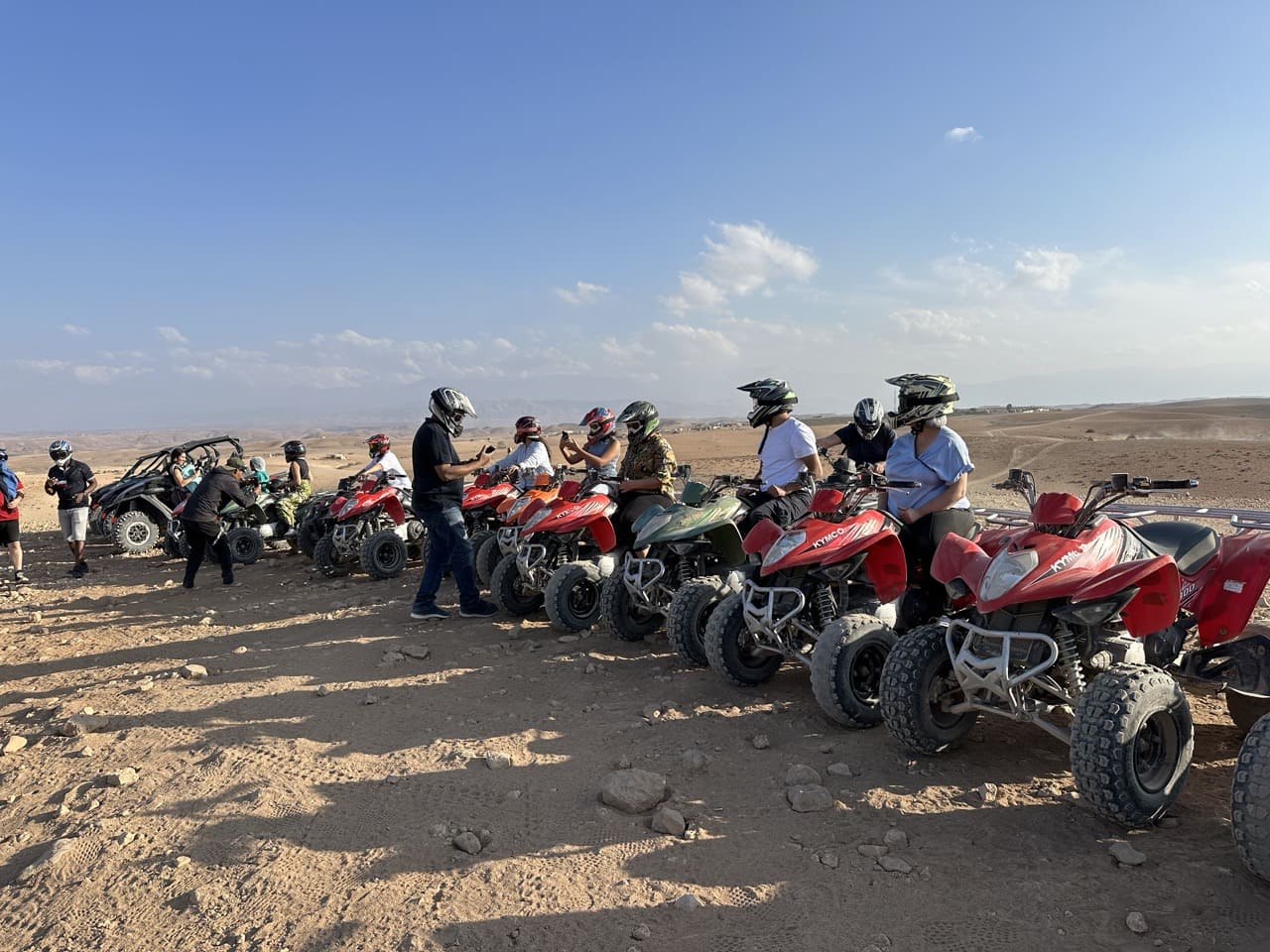 Explore the Agafay Desert with our exclusive package: quad, camel ride, and lunch or dinner with a show
